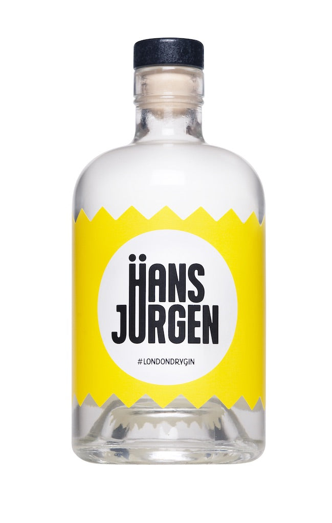 Flasche Hans-Jürgen Gin "Heißzeit" mit markantem gelbem Etikett, schwarzer Schrift und modernem London Dry Gin-Design.