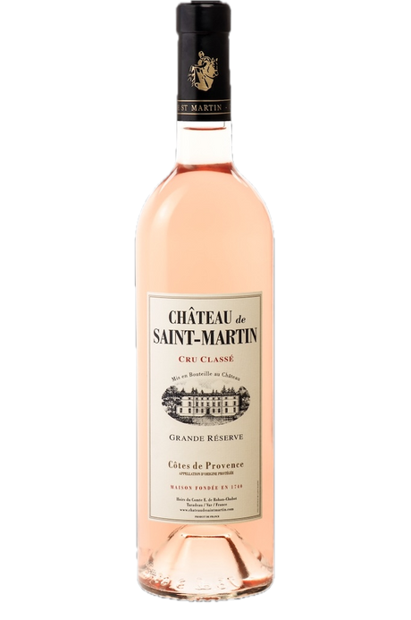 Flasche Château de Saint Martin Grande Réserve Rosé, Cru Classé, Côtes de Provence, mit hellrosa Farbe und hellem Etikett.