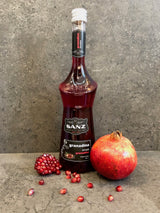 Flasche Sanz Grenadine Sirup, 70cl, aus Spanien, mit Granatapfel und frischen Kernen