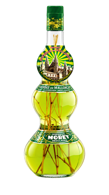 Morey Hierbas de Mallorca halbtrocken Kräuterlikör mit Kräuterzweigen in der Flasche