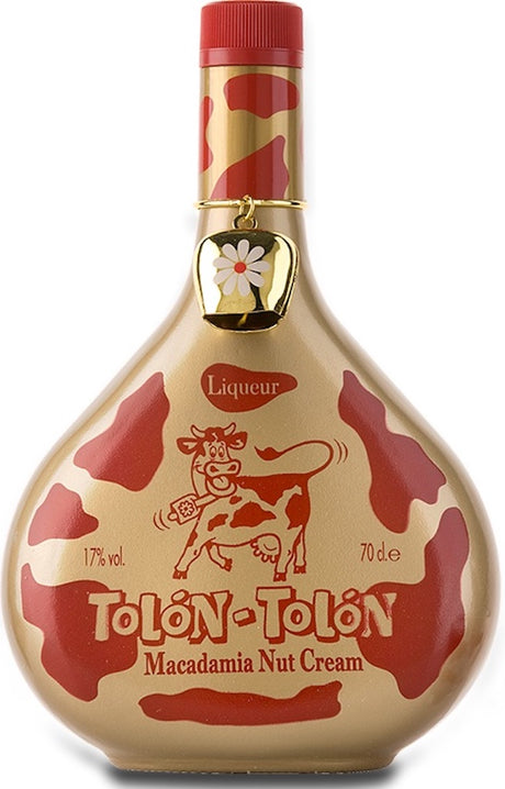 "Tolon-Tolon Macadamia Nut Cream Liqueur in einer dekorativen Flasche mit rotem Verschluss und verspieltem Kuhdesign, 70 cl."